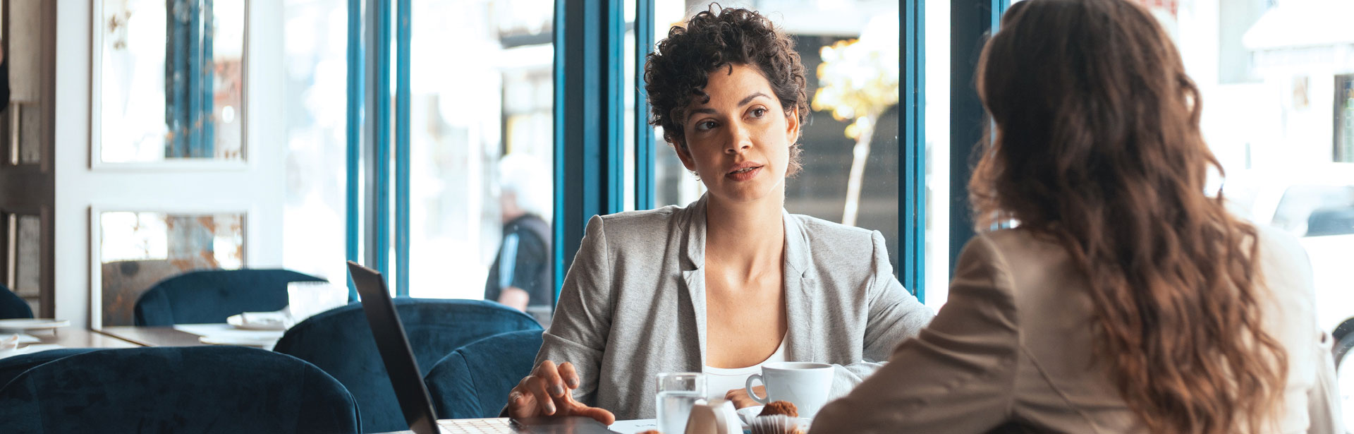 Business Woman and client discussing paperwork